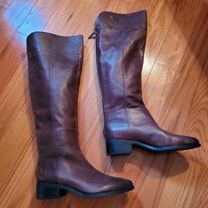 Vince Camuto boots with back zipper detail.